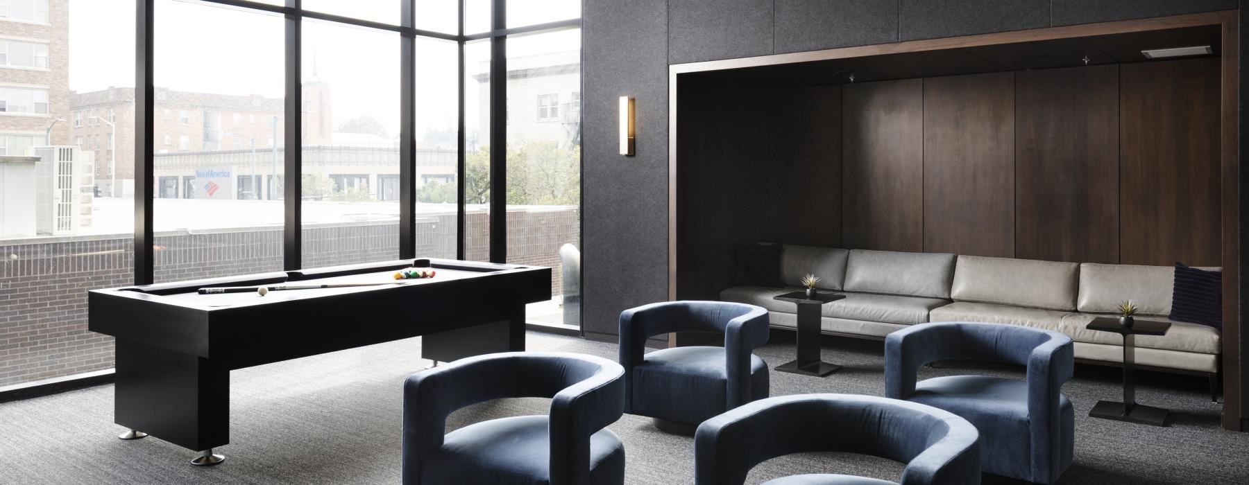 a room with a table and chairs